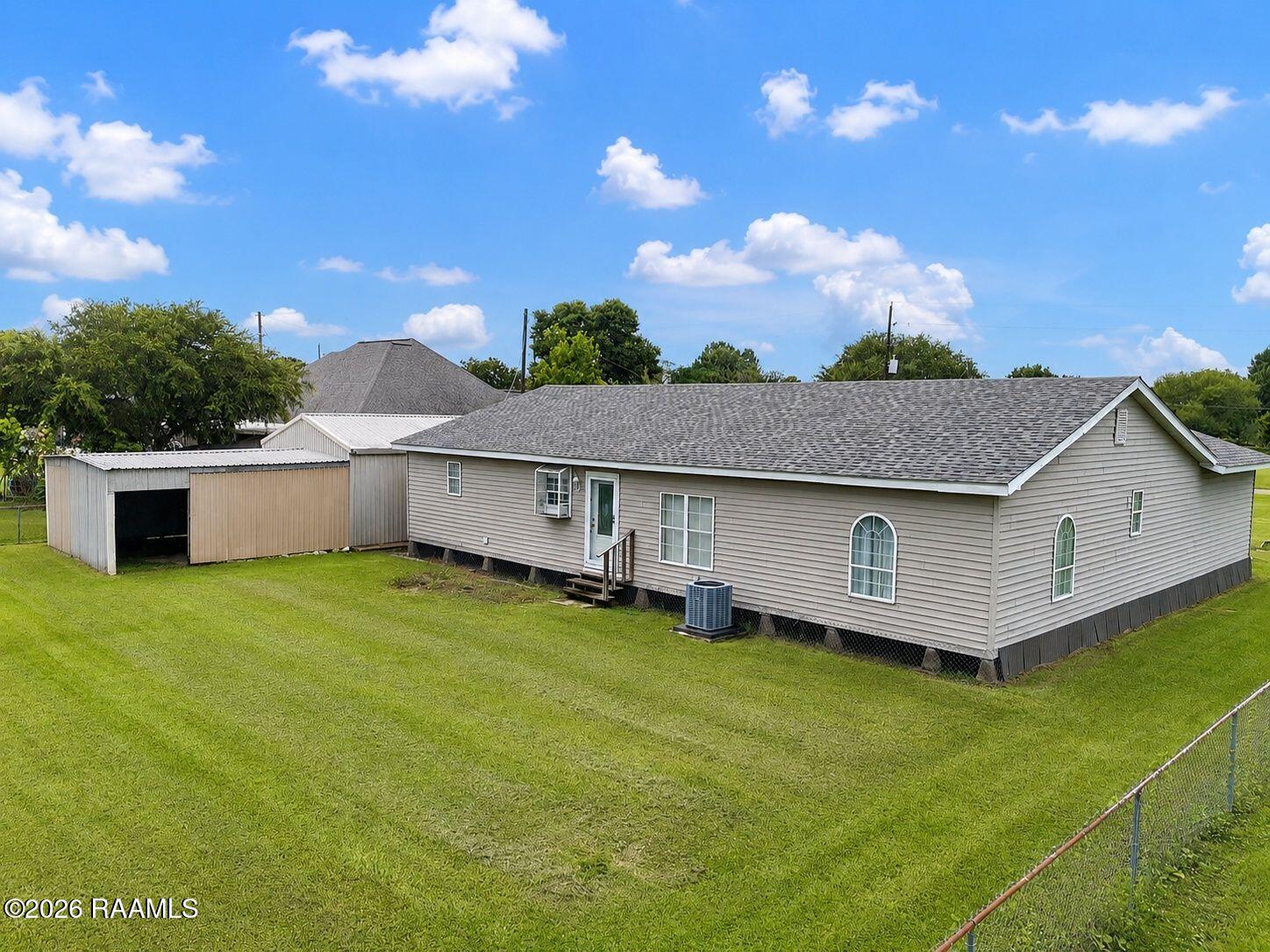 2903 Stacey Road Broussard, LA 70518 - Photo 43 of 48 7-web-or-mls-07-rear-exterior-storage-bu