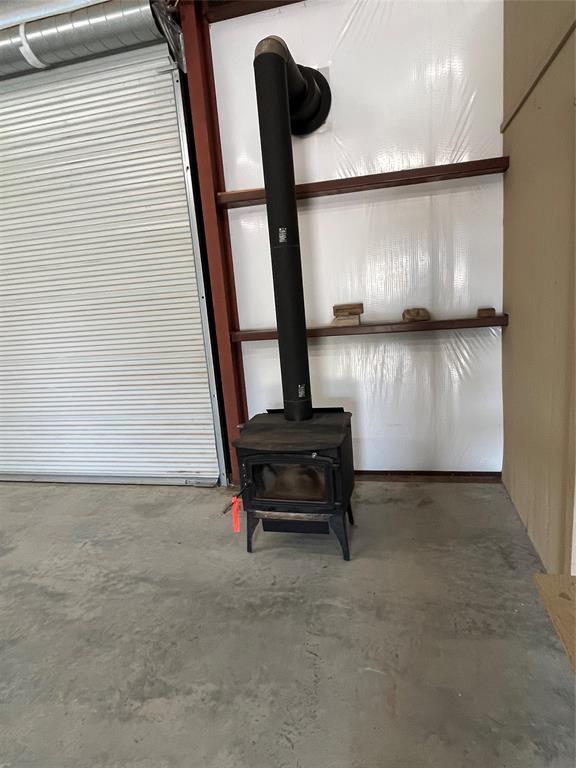 2190 West Fm 574 Road West Mullin, TX 76864 - Photo 11 of 40 wood stove in shop