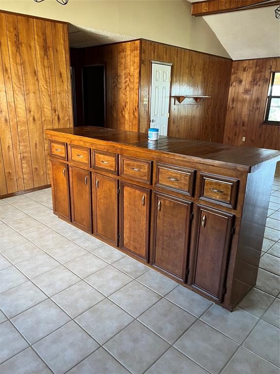 2190 West Fm 574 Road West Mullin, TX 76864 - Photo 26 of 40 a view of a refrigerator in kitchen and wooden floor