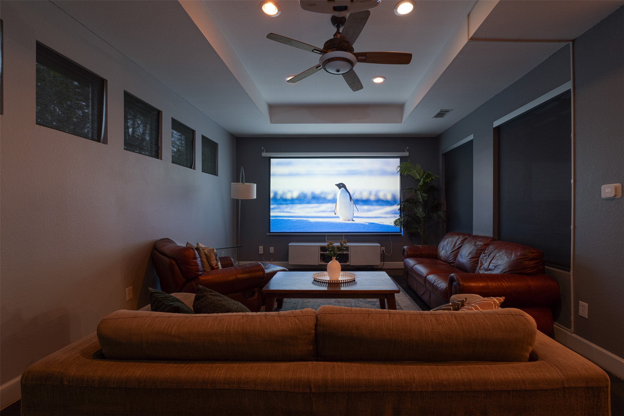 2302 East 9th Street Austin, TX 78702 - Photo 7 of 31 Experience cinema-quality entertainment in this dedicated home theater space.