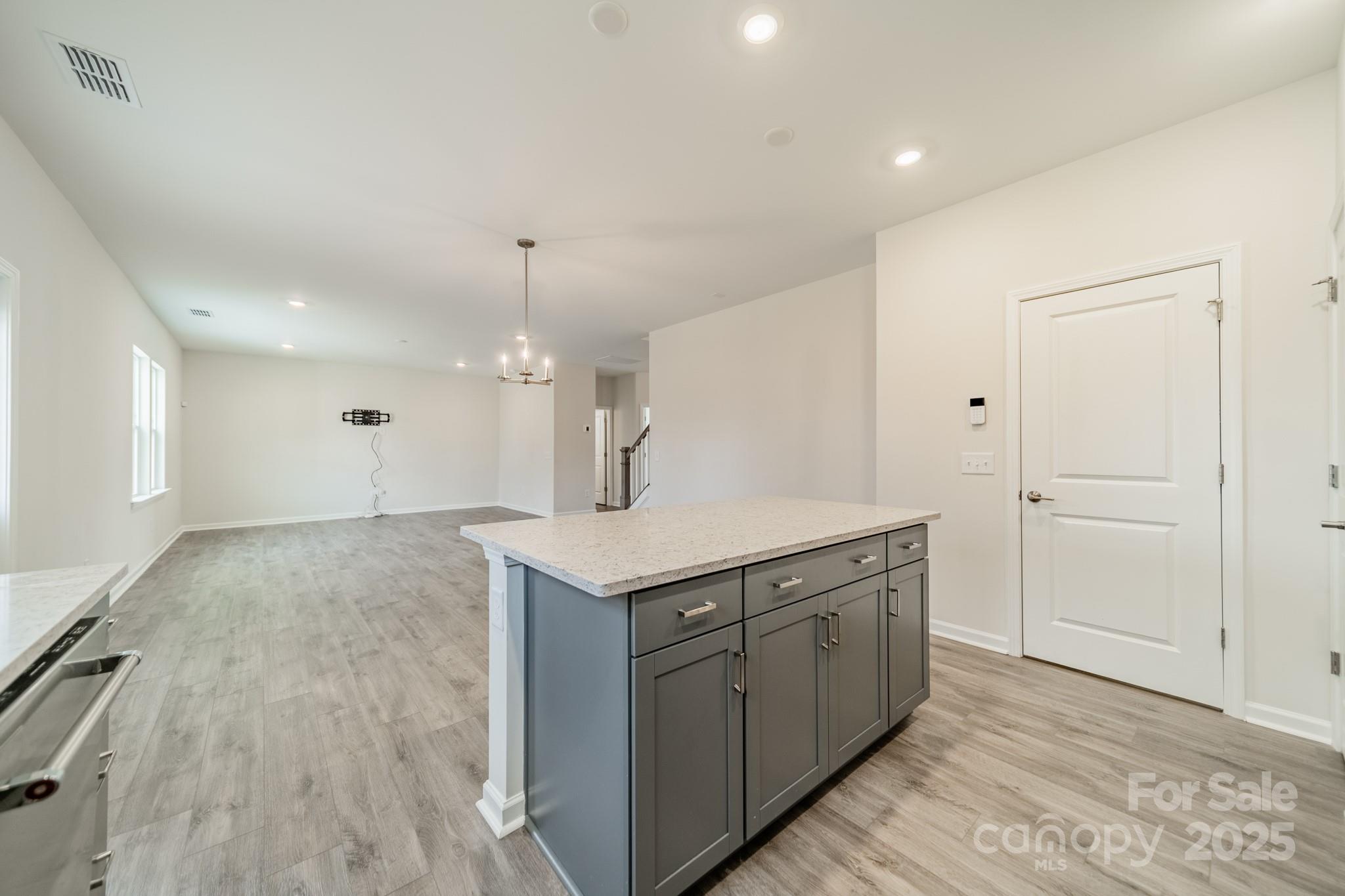 6012 Chumbley Pt Road Charlotte, NC 28215 - Photo 17 of 46 a kitchen with a sink and cabinets