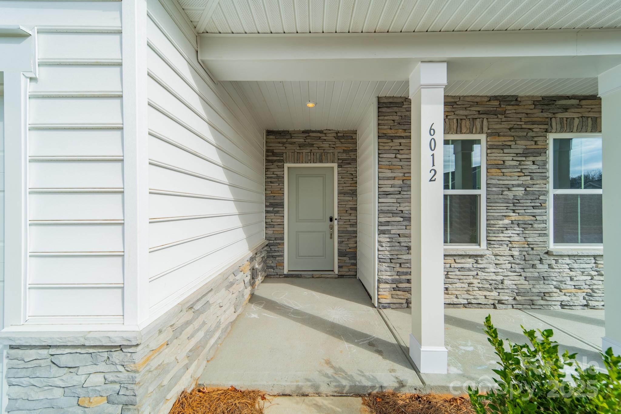 6012 Chumbley Pt Road Charlotte, NC 28215 - Photo 2 of 46 a view of a entryway of the house