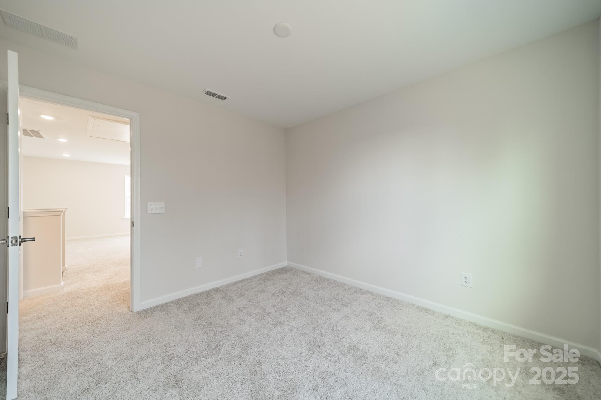 6012 Chumbley Pt Road Charlotte, NC 28215 - Photo 23 of 46 a view of an empty room