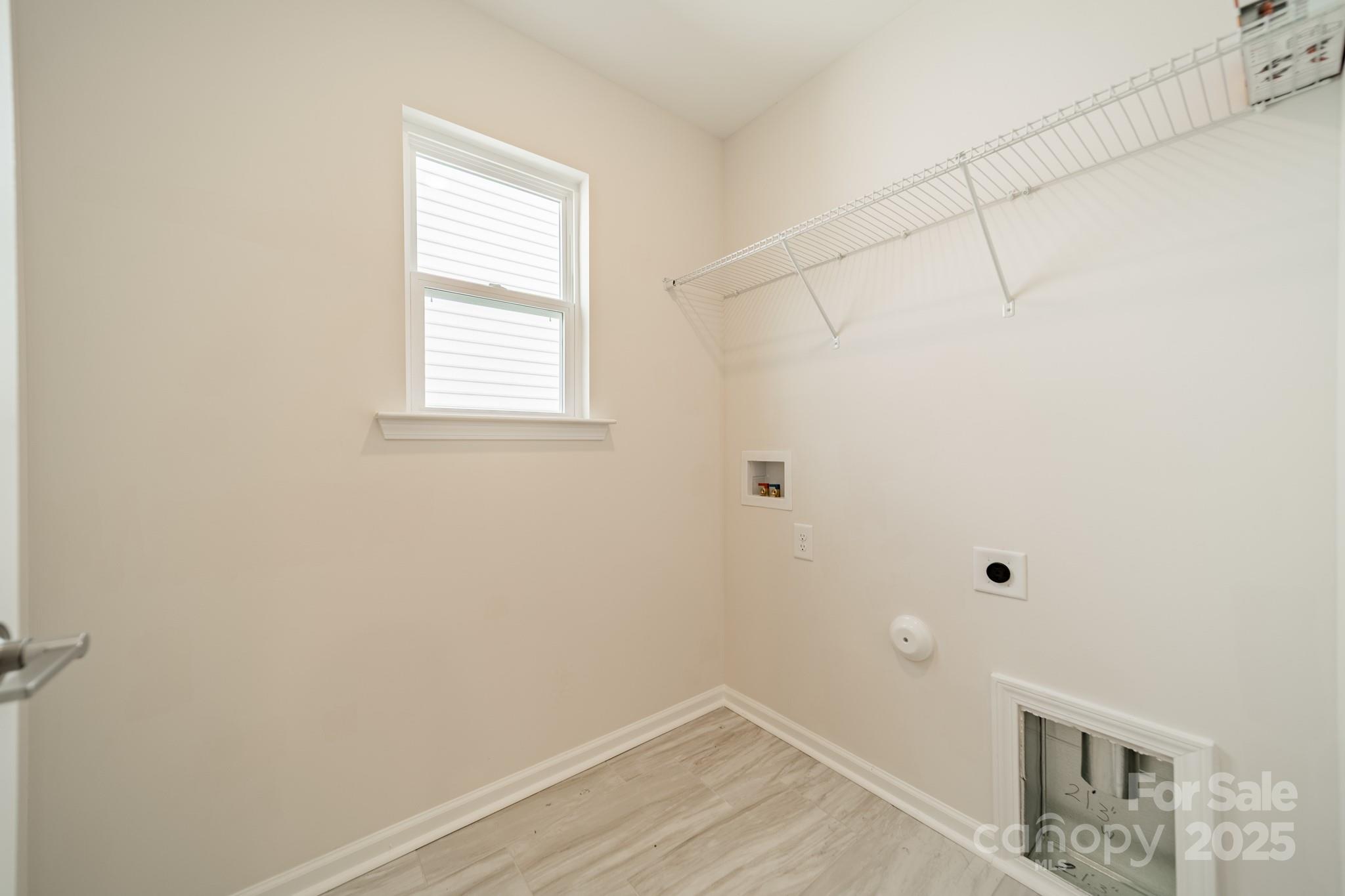 6012 Chumbley Pt Road Charlotte, NC 28215 - Photo 25 of 46 a view of a room that has a window in it