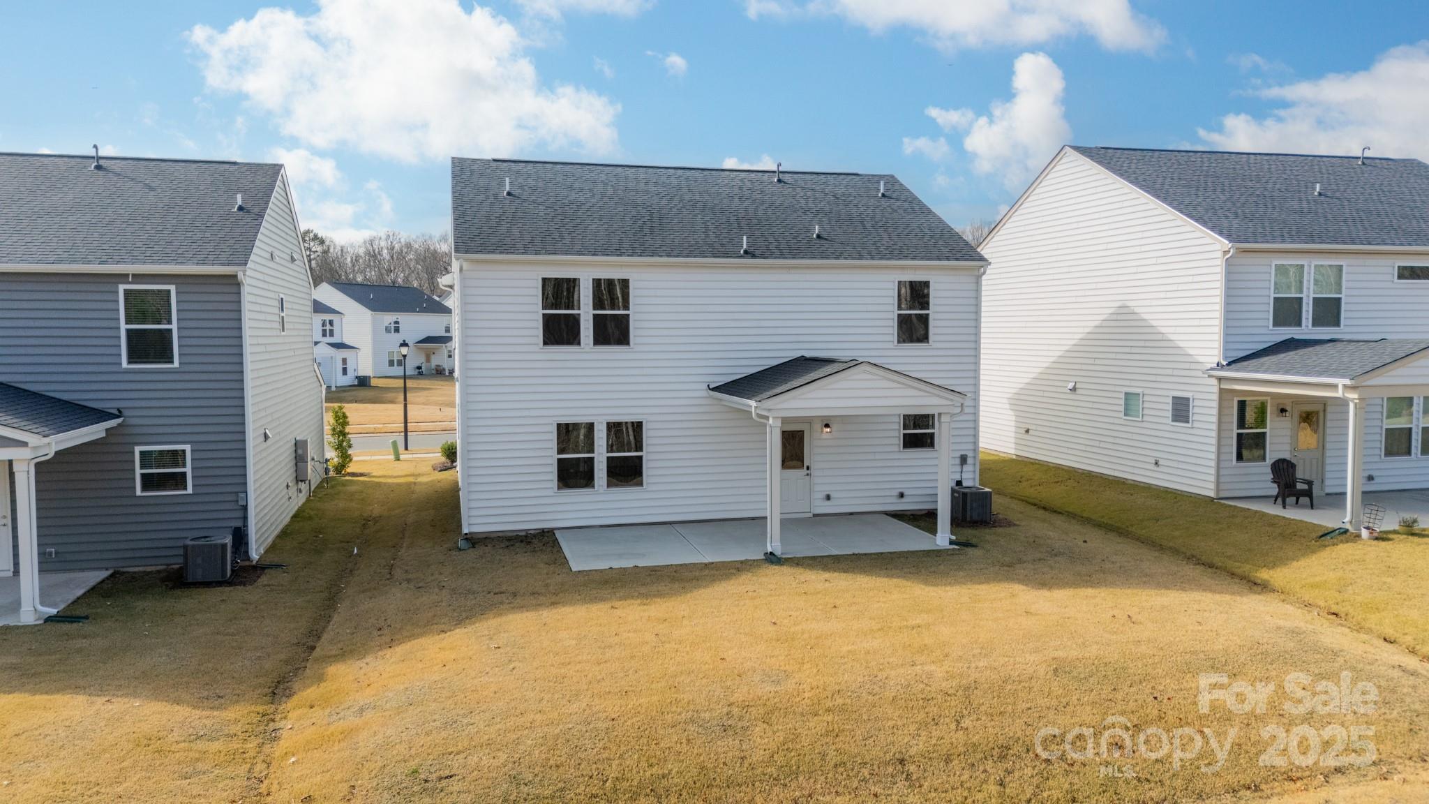 6012 Chumbley Pt Road Charlotte, NC 28215 - Photo 39 of 46 a front view of house with yard