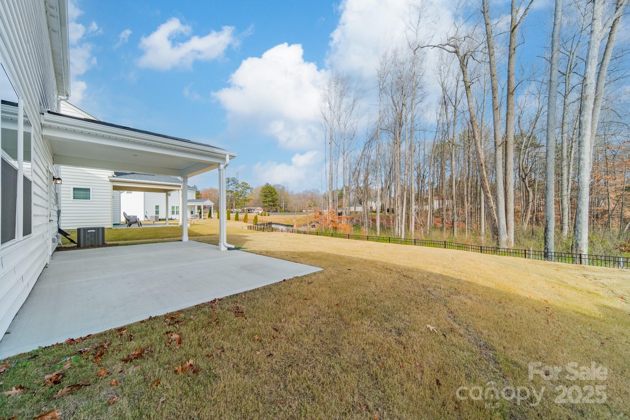 6012 Chumbley Pt Road Charlotte, NC 28215 - Photo 42 of 46 a view of yard with large trees