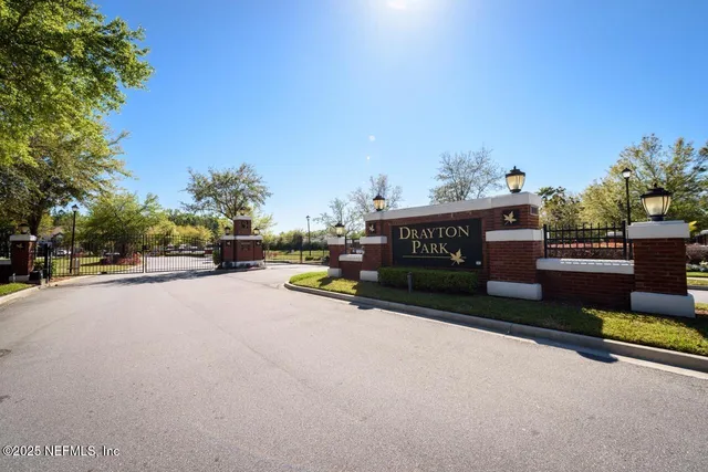 a view of street with parked cars