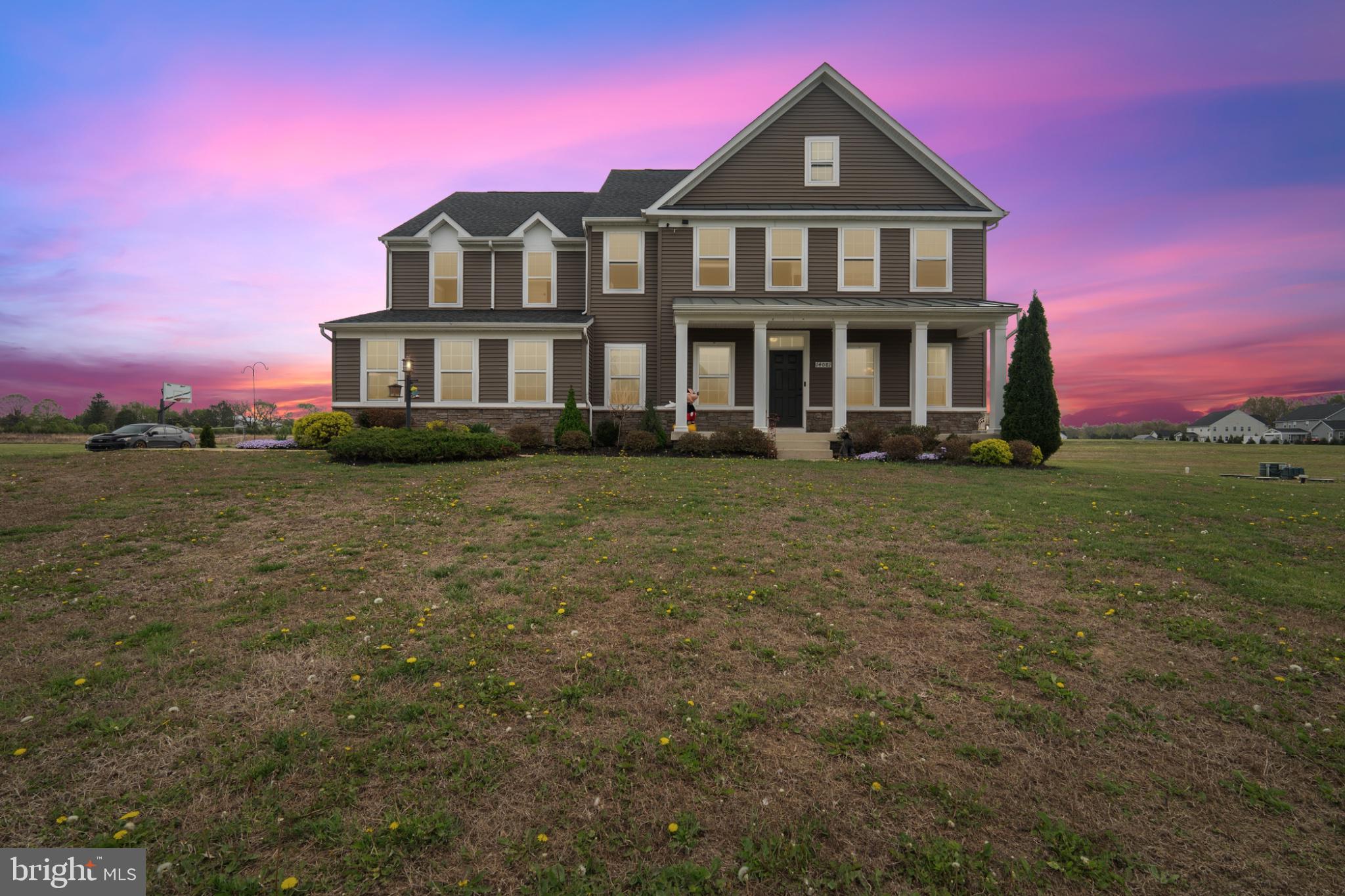 14081 Carriage Ford Road Nokesville, VA 20181 - Photo 1 of 38 Charming home under a vibrant sky.
