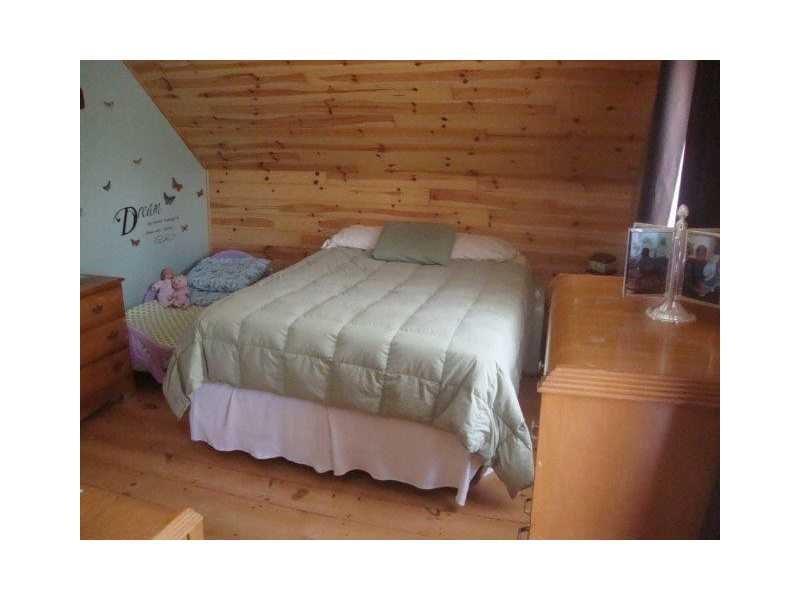 47 North Guilford Road Monson, ME 04464 - Photo 3 of 14 one of three bedrooms upstairs with...