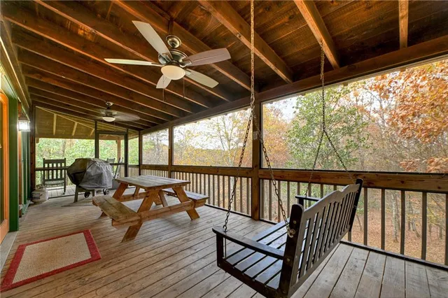 a view of sitting area with furniture and wooden floor