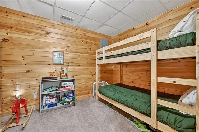 a yellow room with rug