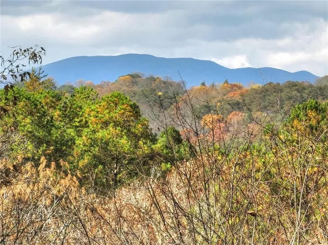 a view of mountain view with mountains in the background