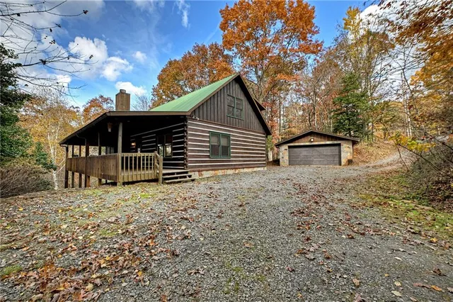 a house with trees in the background