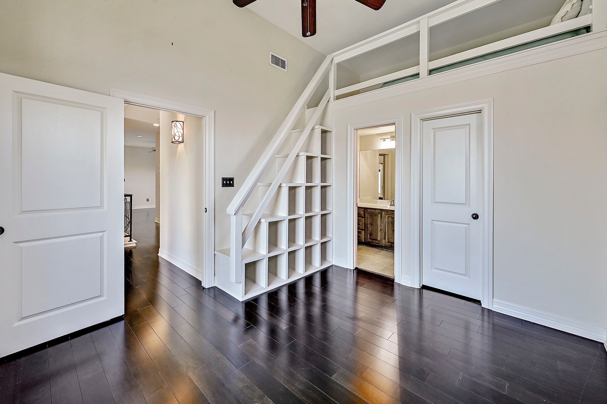 13201 Winding Creek Road Austin, TX 78736 - Photo 22 of 39 a view of entryway with wooden floor and stairs