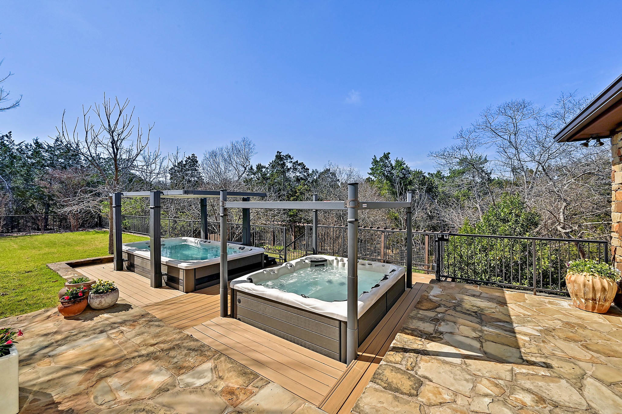 13201 Winding Creek Road Austin, TX 78736 - Photo 27 of 39 a view of a swimming pool with a patio and a yard