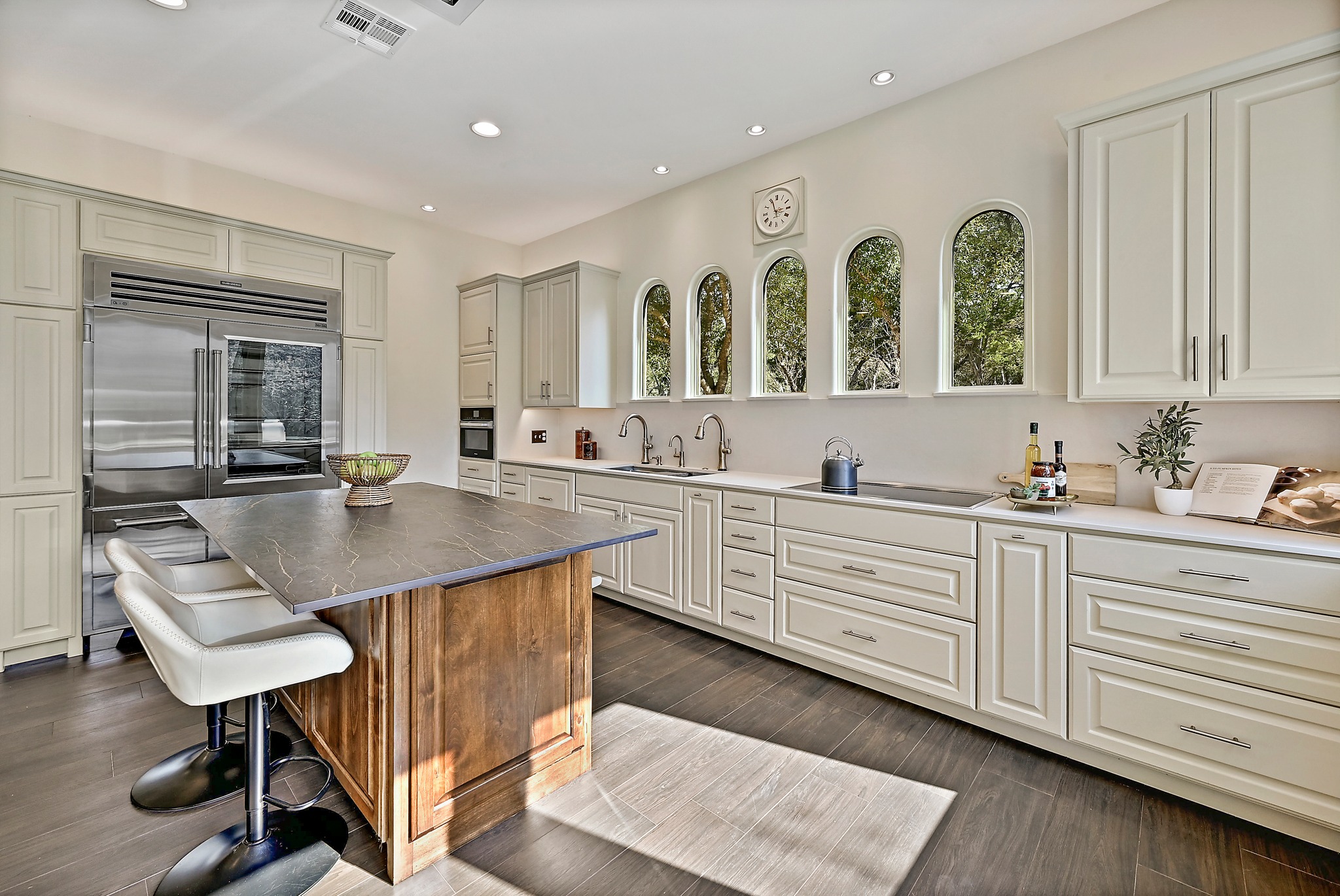 13201 Winding Creek Road Austin, TX 78736 - Photo 4 of 39 a kitchen with a sink cabinets and window