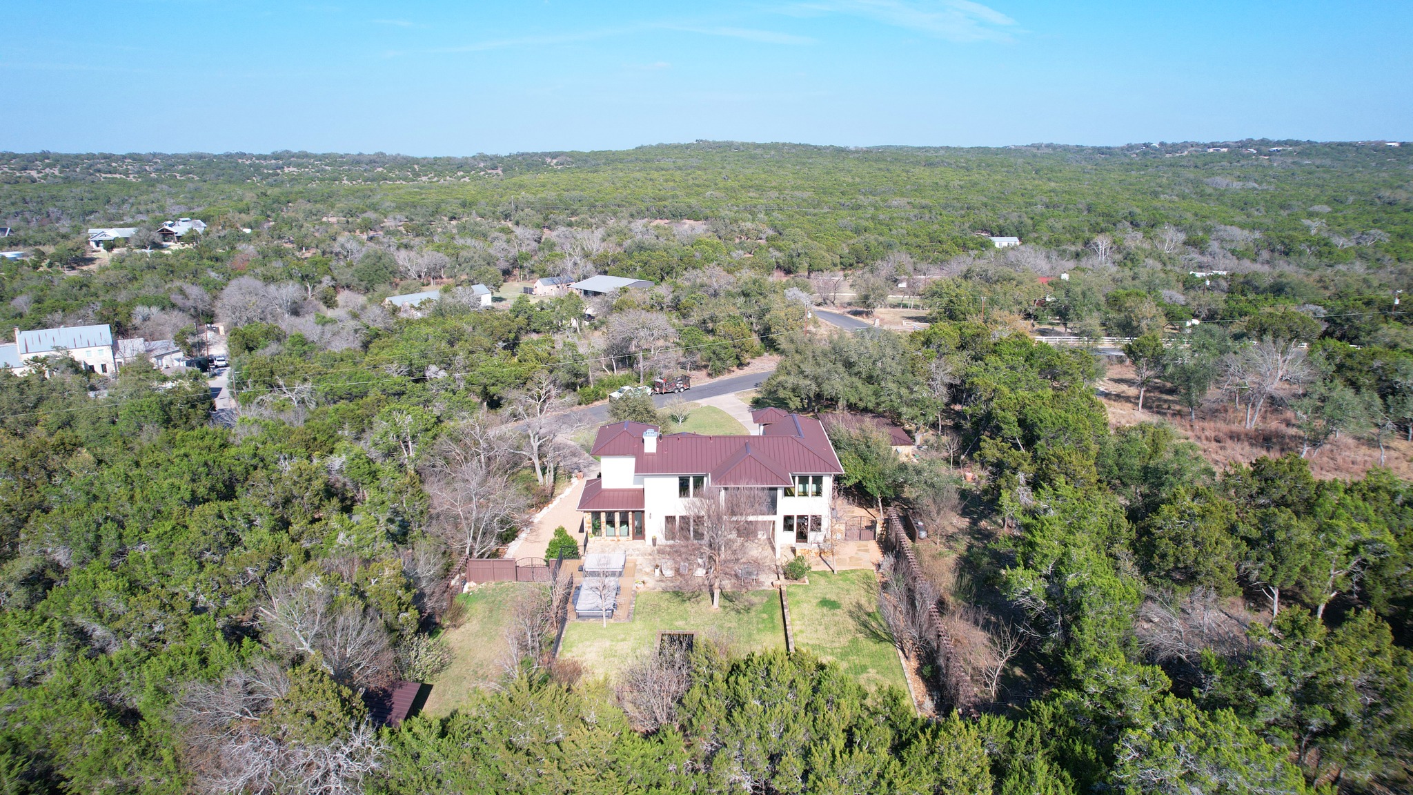 13201 Winding Creek Road Austin, TX 78736 - Photo 8 of 39 an aerial view of residential houses with outdoor space and trees
