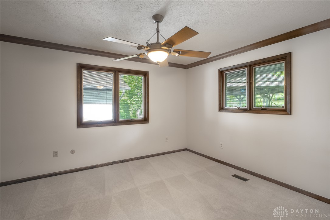 273 North Alpha Bellbrook Road Dayton, OH 45434 - Photo 30 of 43 This bright room features elegant trim, inviting carpet, and ample natural light.