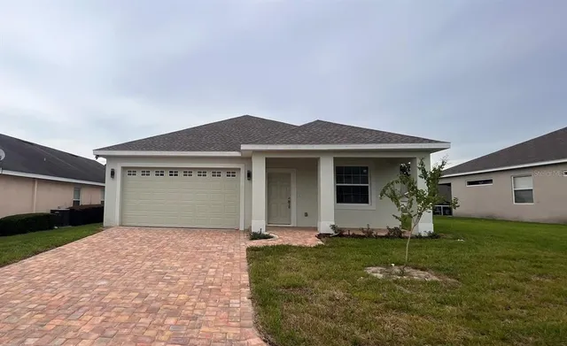 a front view of house with yard