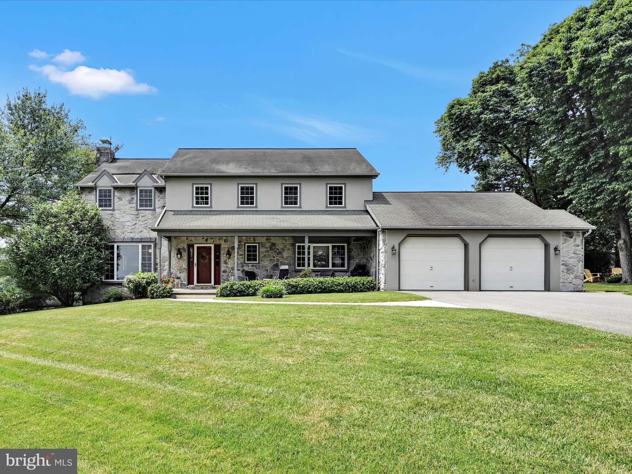 350 Indian Run Road Stevens, PA 17578 - Photo 1 of 72 a view of a big house with a big yard and large trees