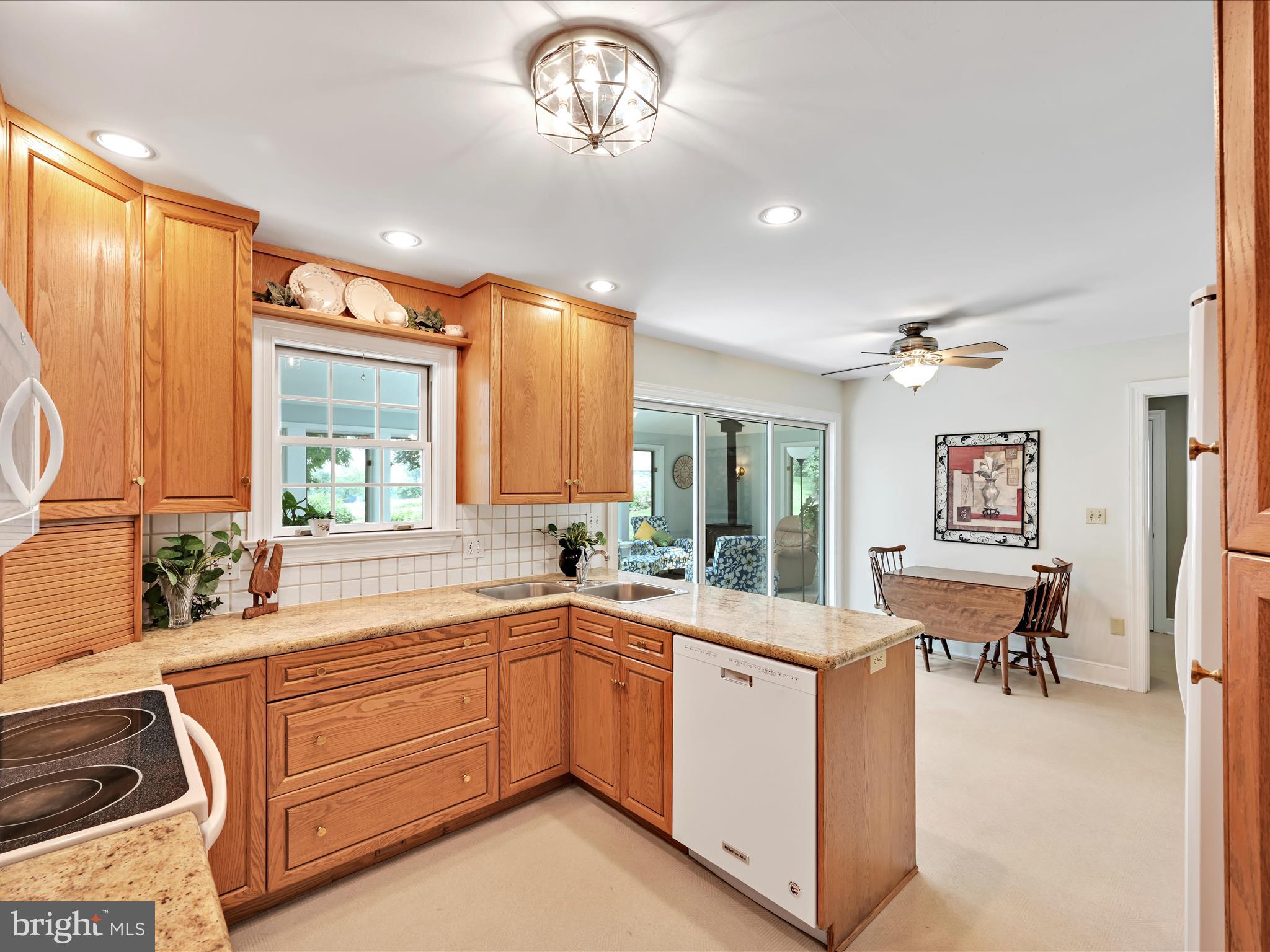 350 Indian Run Road Stevens, PA 17578 - Photo 14 of 72 a large white kitchen with a large window