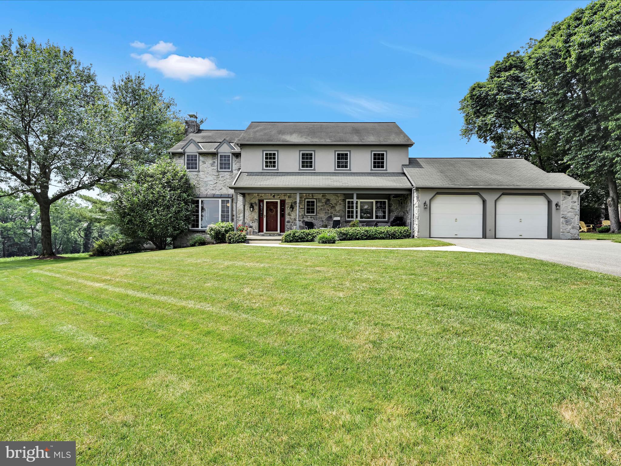 350 Indian Run Road Stevens, PA 17578 - Photo 3 of 72 a view of house with a big yard and large trees