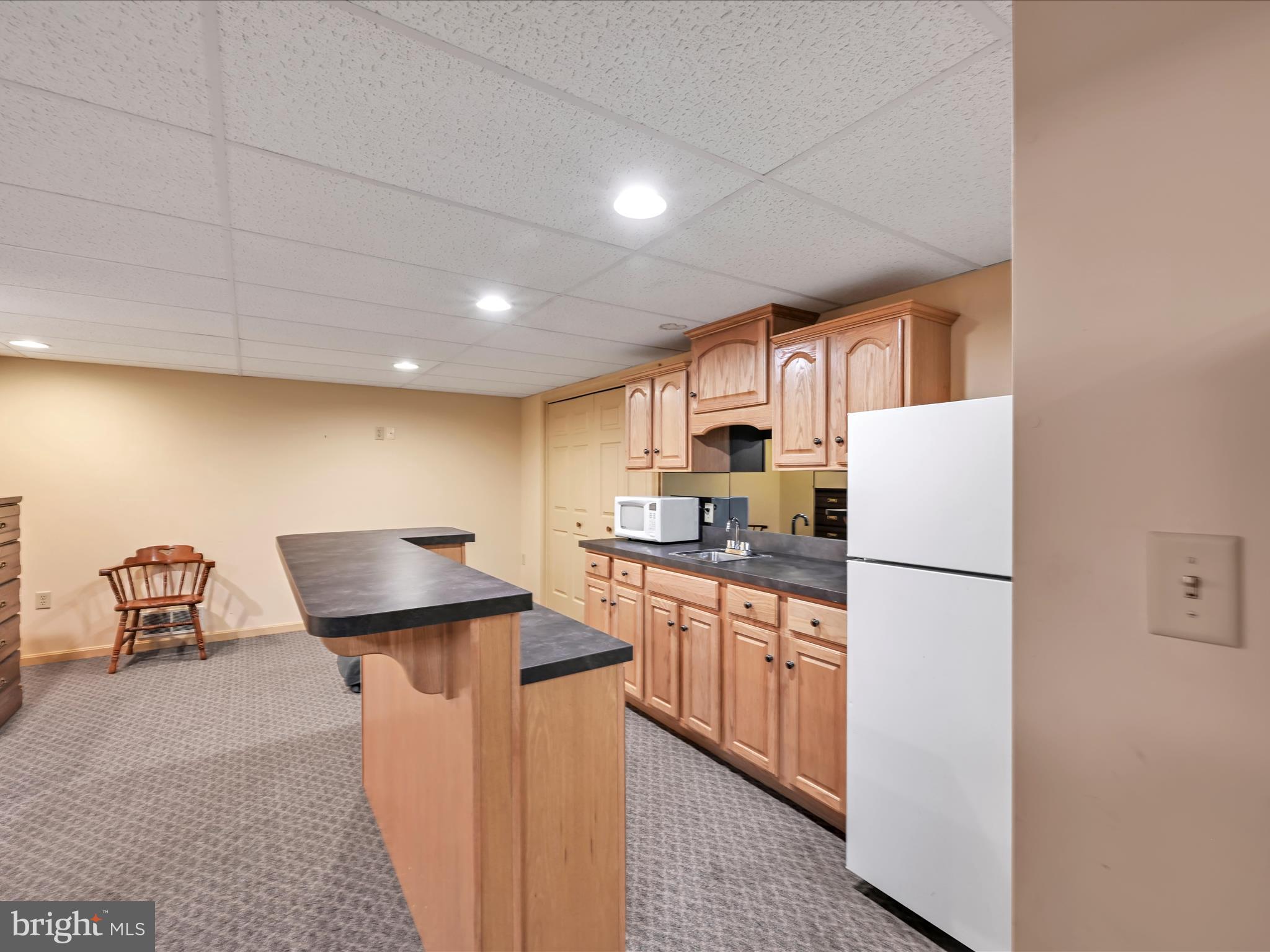 350 Indian Run Road Stevens, PA 17578 - Photo 39 of 72 a kitchen with stainless steel appliances a refrigerator sink and white cabinets
