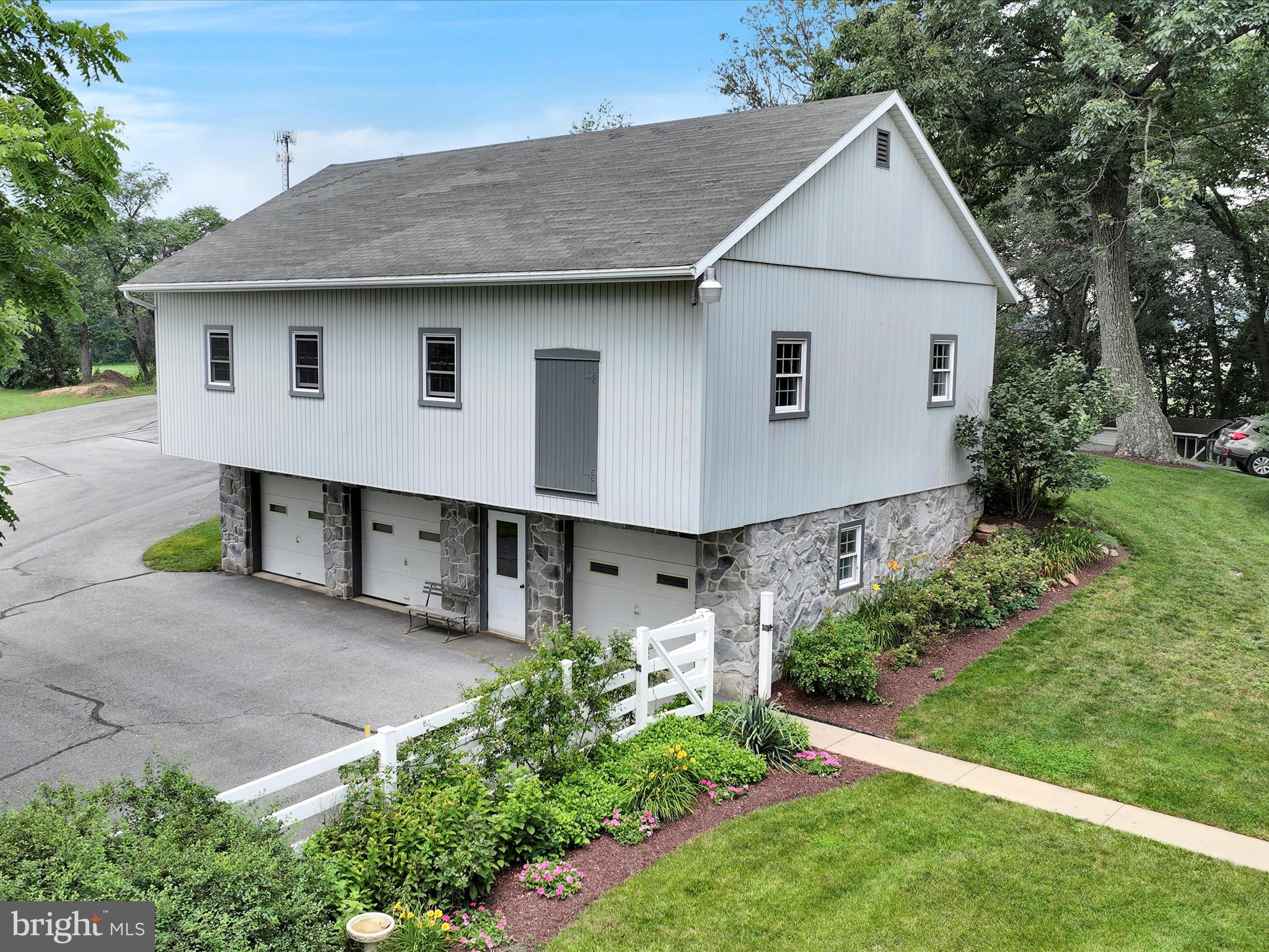 350 Indian Run Road Stevens, PA 17578 - Photo 65 of 72 a view of a house with a yard plants and large tree