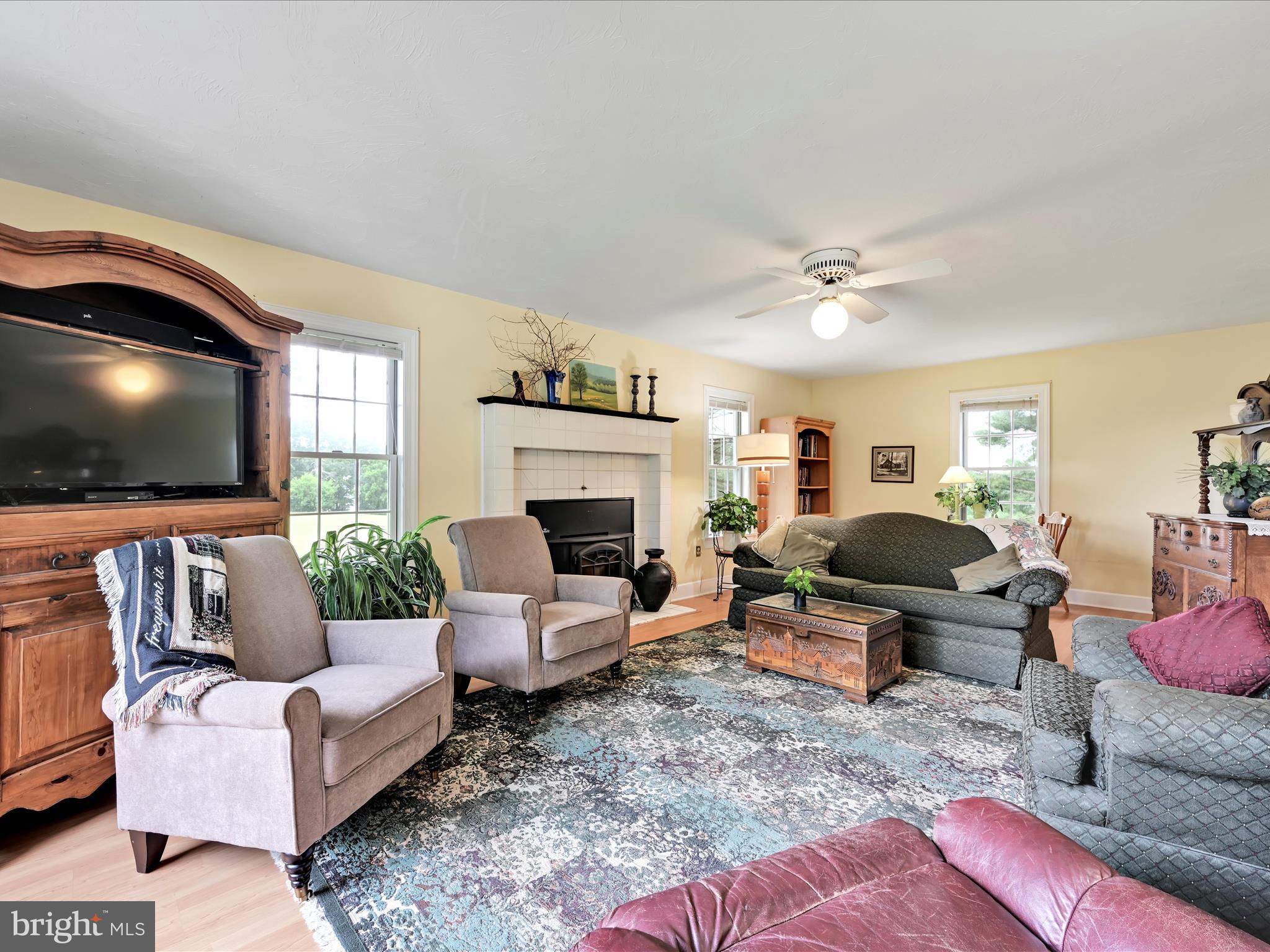 350 Indian Run Road Stevens, PA 17578 - Photo 8 of 72 a living room with furniture and a flat screen tv