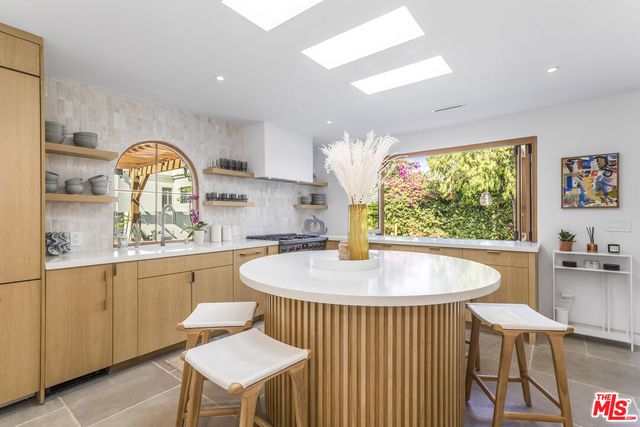 a bathroom with a sink and a shower