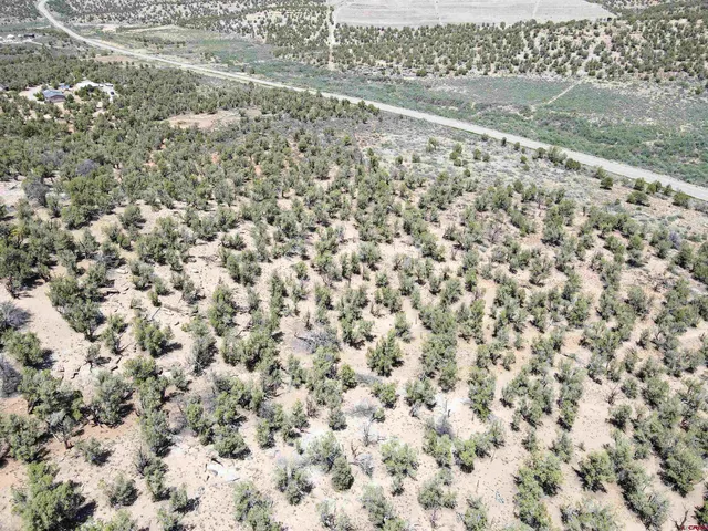 a view of a field with an outdoor space