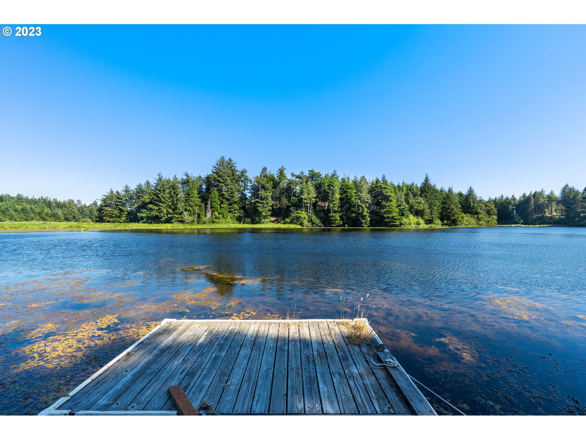 87268 Ruby Lane Bandon, OR 97411 - Photo 11 of 47 a view of lake with green space