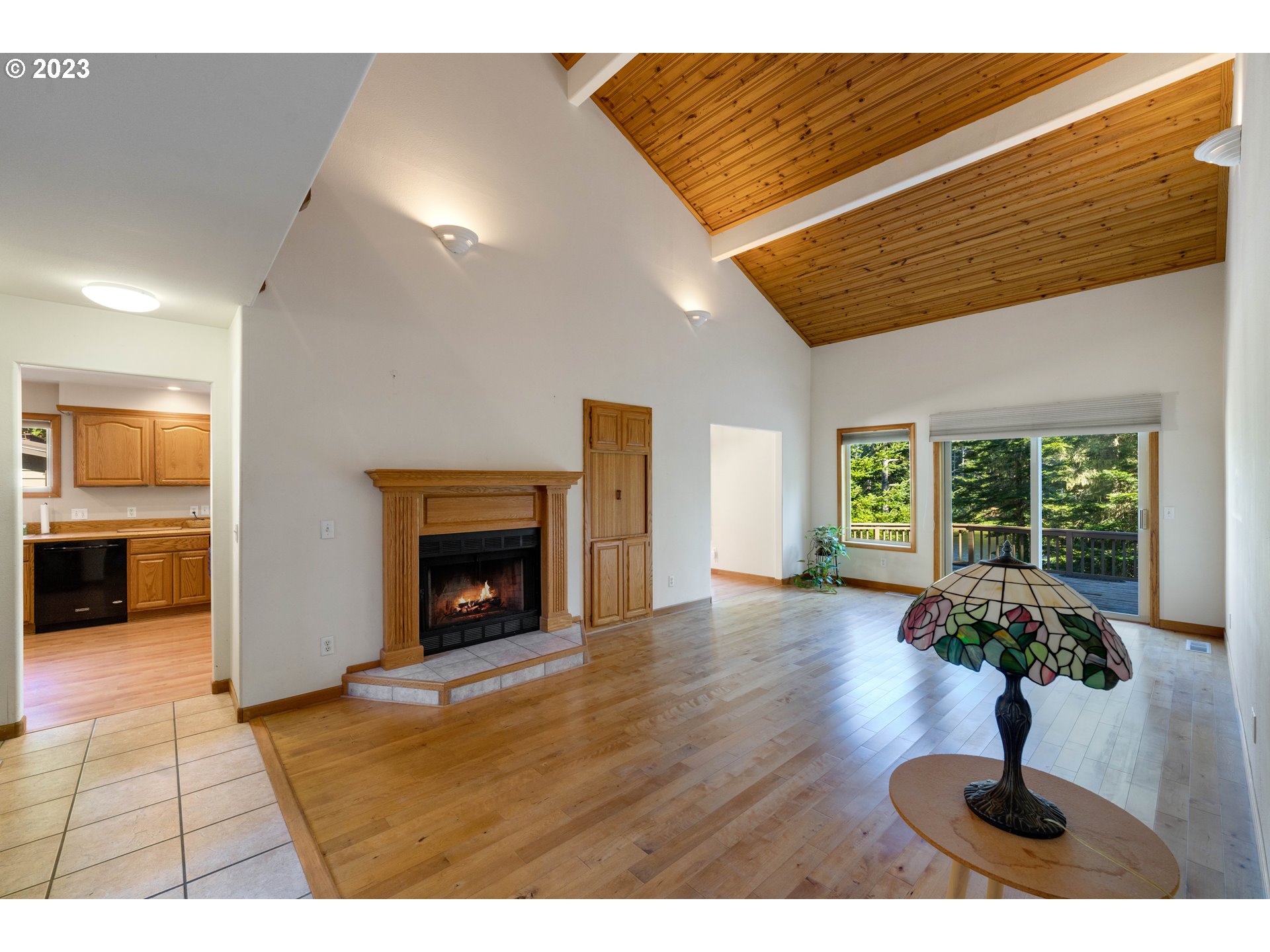 87268 Ruby Lane Bandon, OR 97411 - Photo 14 of 47 a view of an empty room with furniture and a fireplace