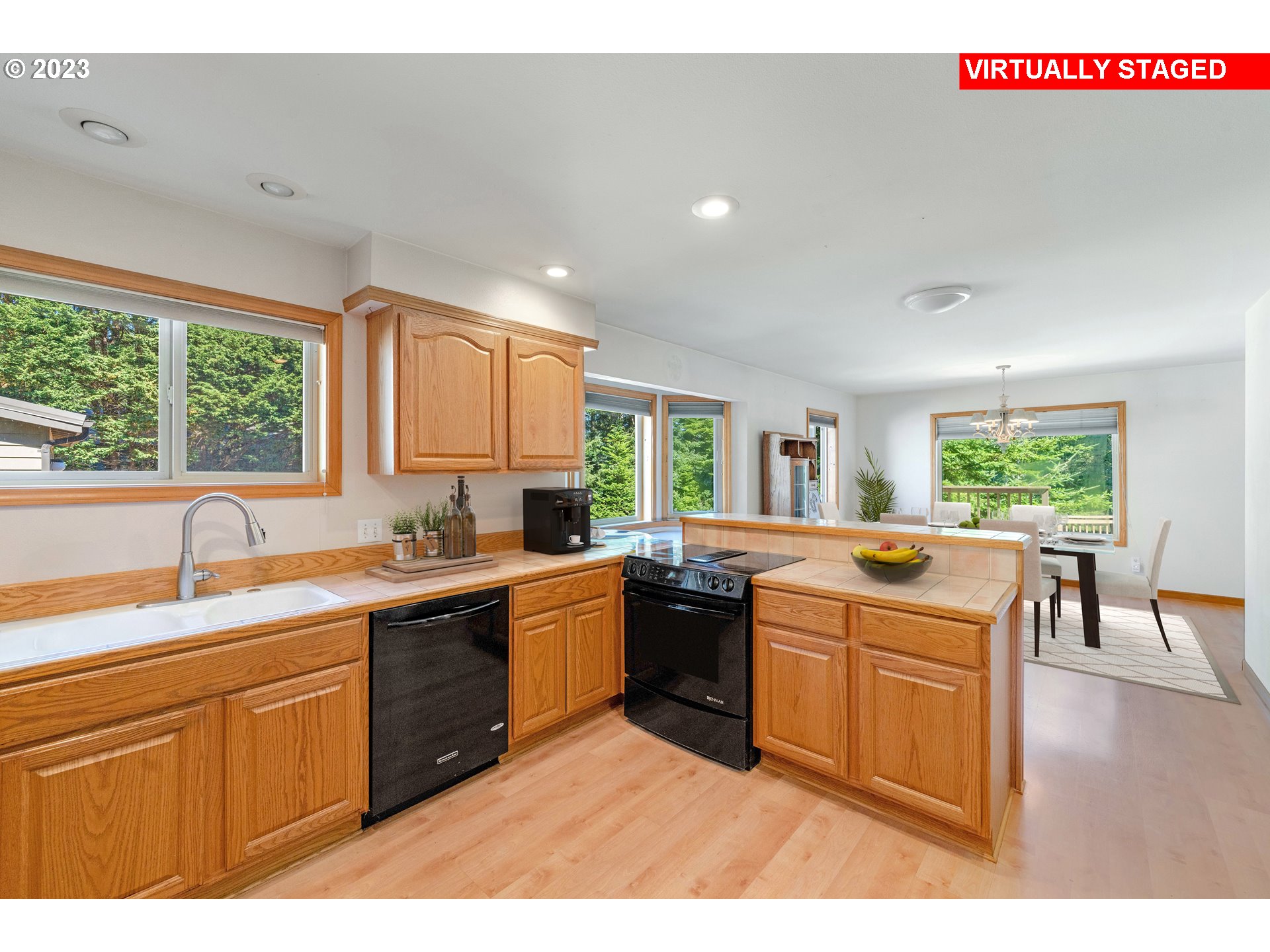 87268 Ruby Lane Bandon, OR 97411 - Photo 20 of 47 a kitchen with a sink stove and cabinets