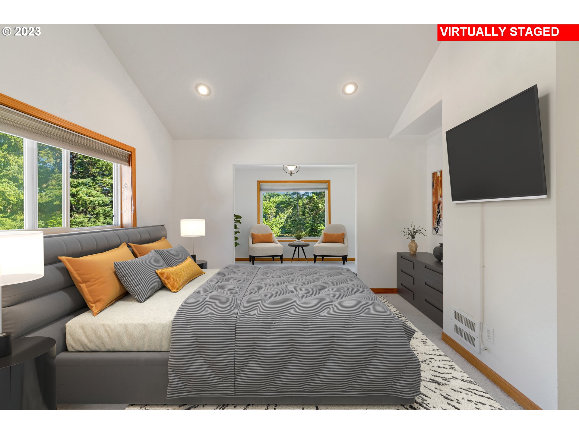 87268 Ruby Lane Bandon, OR 97411 - Photo 26 of 47 a bedroom with a bed and a flat screen tv