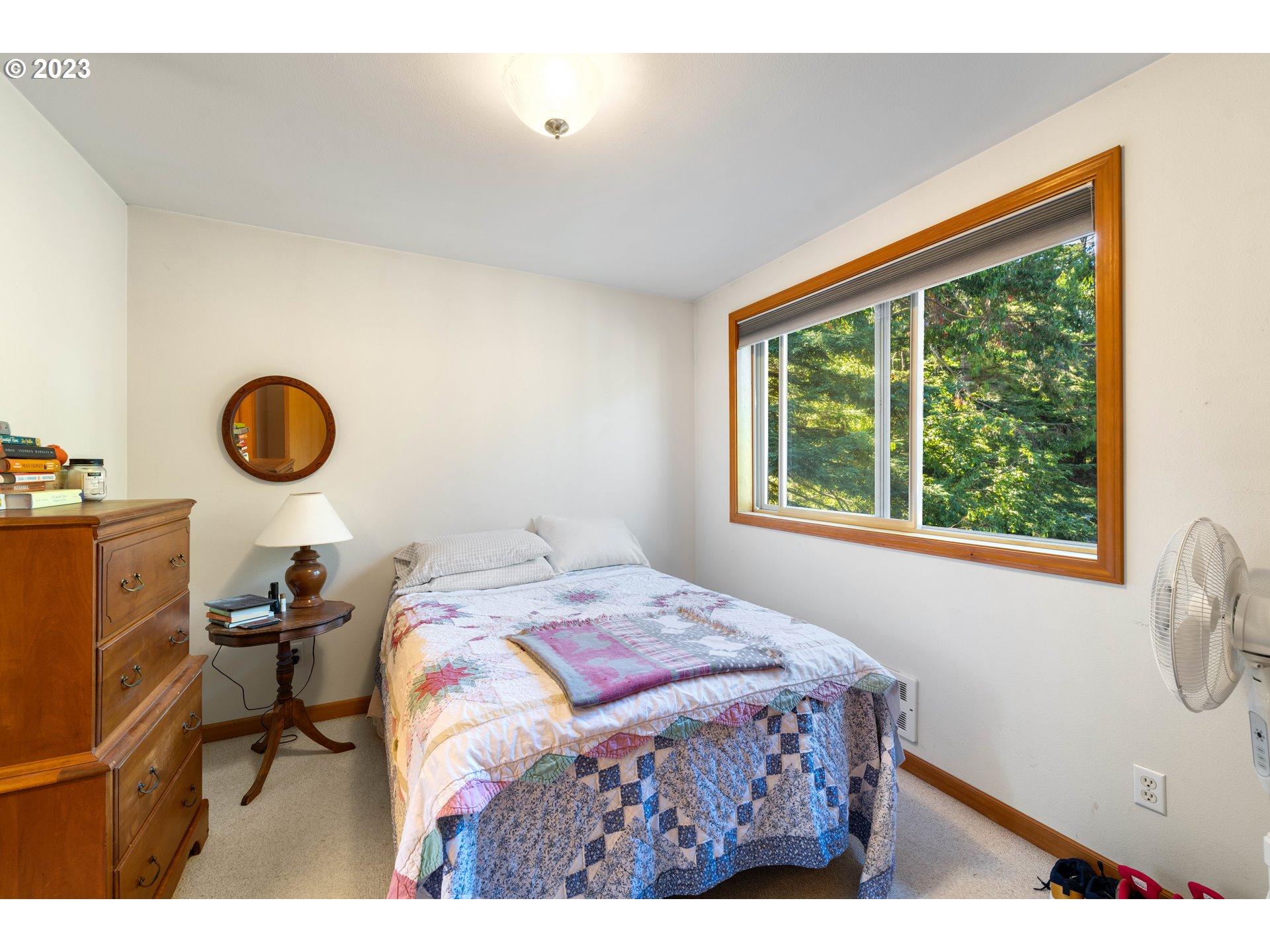 87268 Ruby Lane Bandon, OR 97411 - Photo 30 of 47 a bedroom with a bed and a window