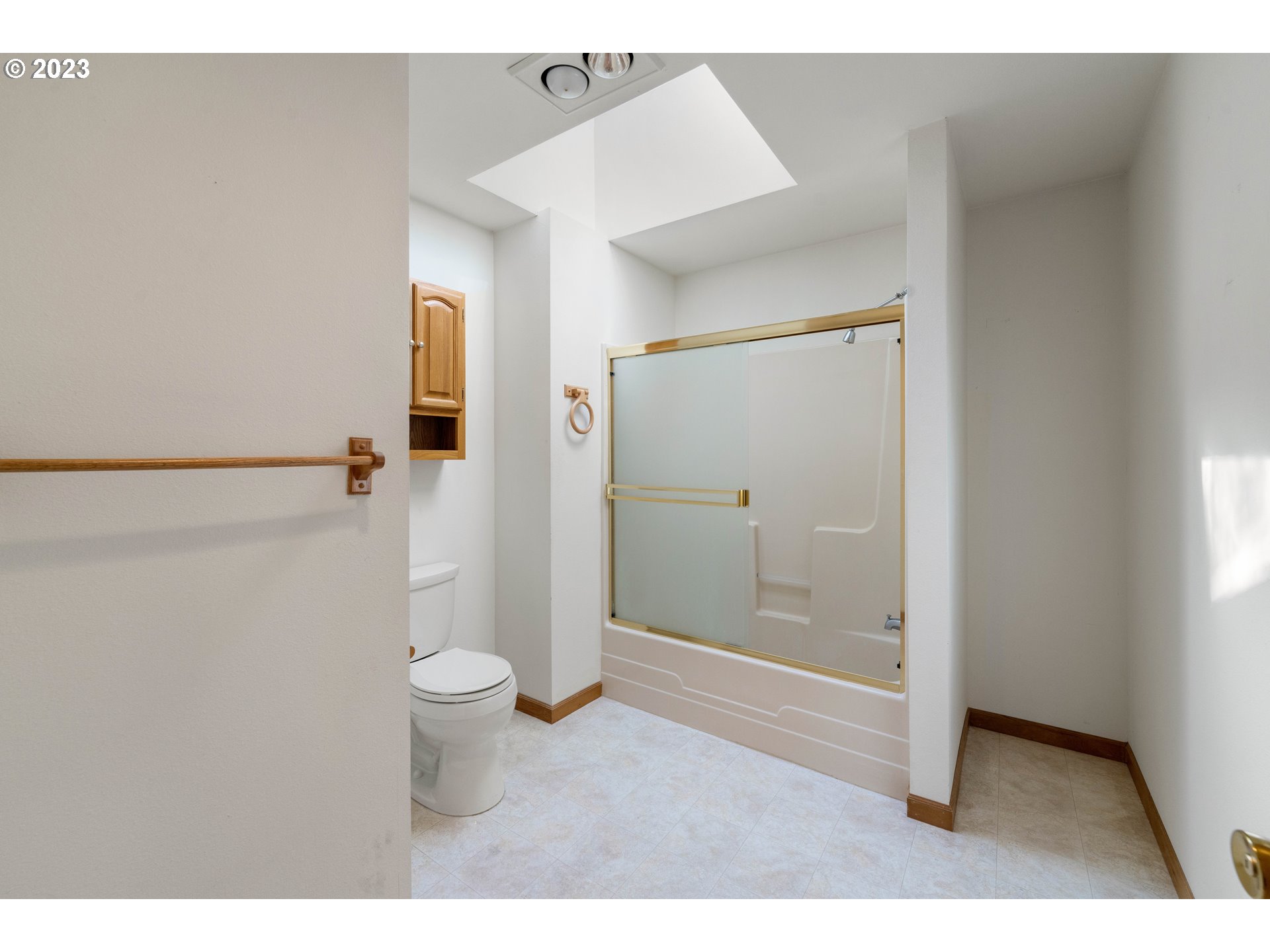 87268 Ruby Lane Bandon, OR 97411 - Photo 33 of 47 a bathroom with a granite countertop shower and a toilet