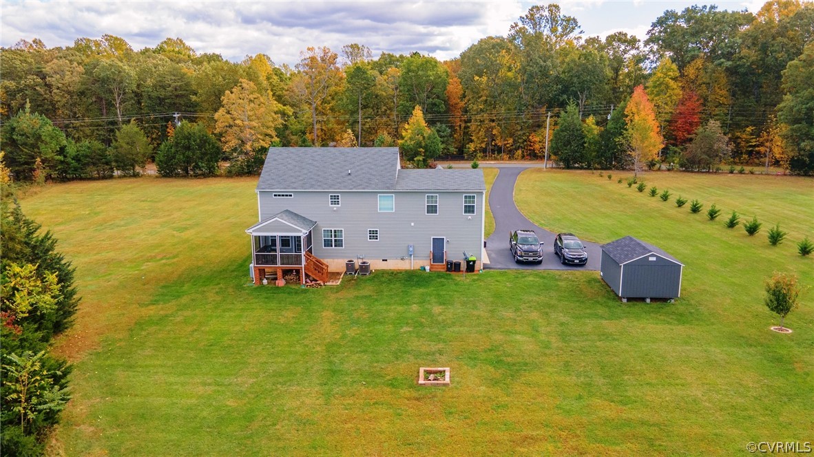552 Waltons Store Road Louisa, VA 23093 - Photo 12 of 50 an aerial view of a house with a garden and swimming pool