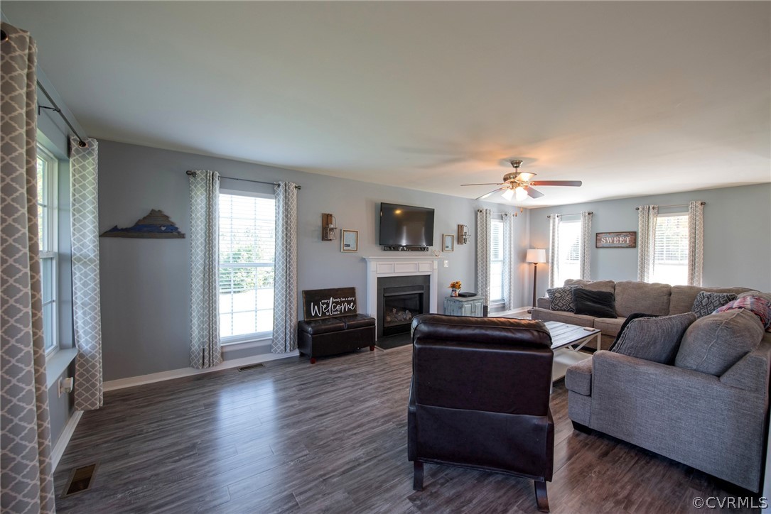 552 Waltons Store Road Louisa, VA 23093 - Photo 22 of 50 a living room with furniture fireplace and flat screen tv