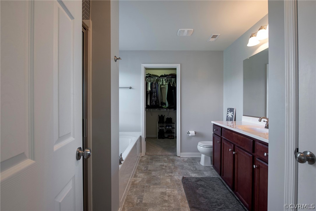 552 Waltons Store Road Louisa, VA 23093 - Photo 36 of 50 a bathroom with a sink and mirror