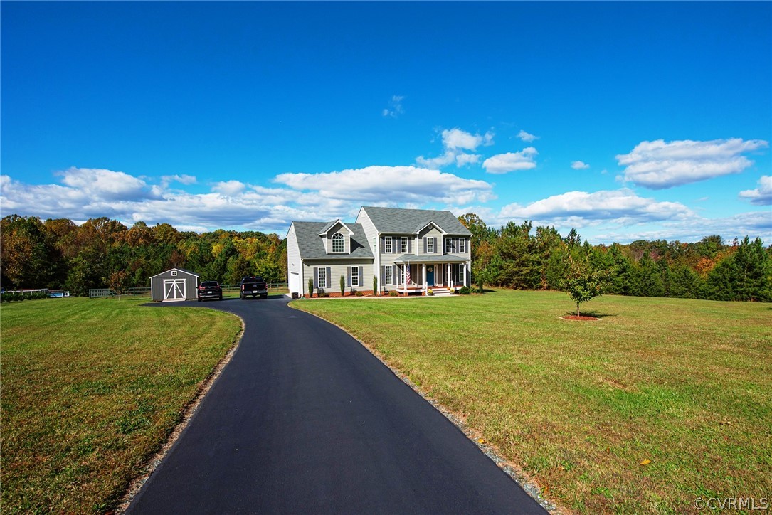 552 Waltons Store Road Louisa, VA 23093 - Photo 4 of 50 a view of a lake with a big yard