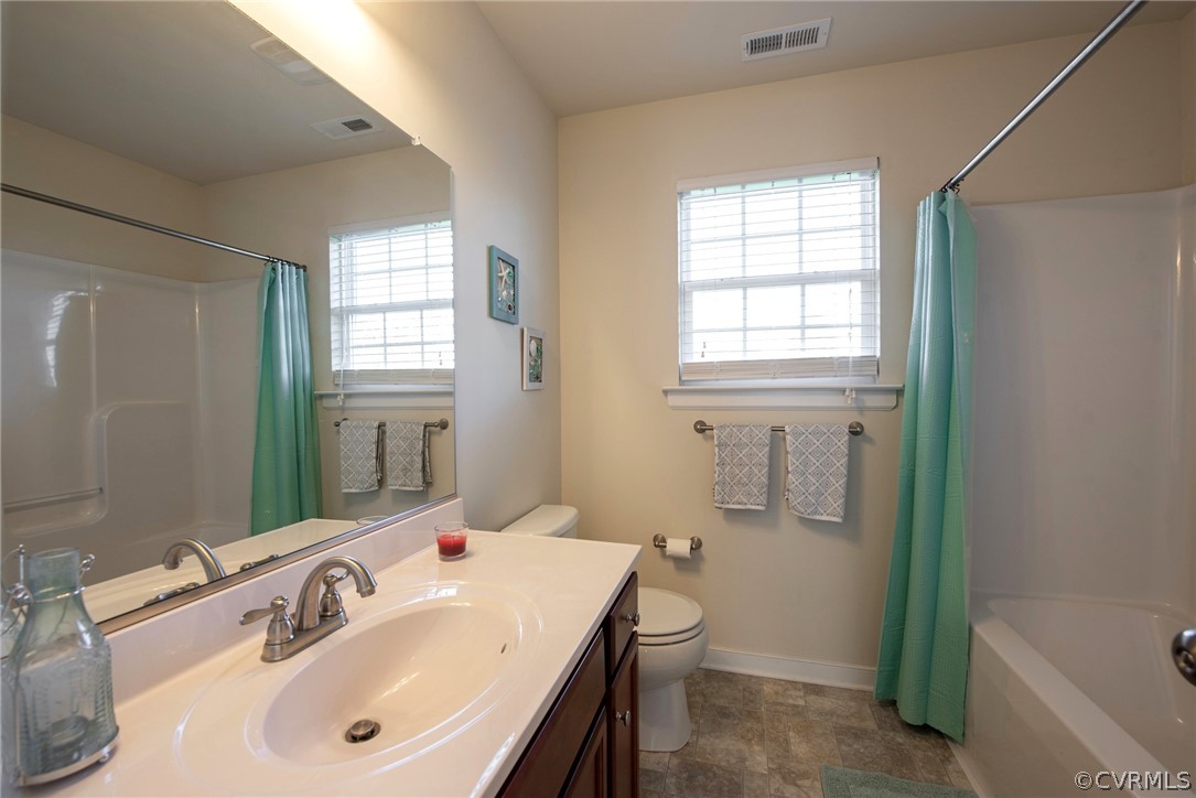552 Waltons Store Road Louisa, VA 23093 - Photo 46 of 50 a bathroom with a sink a toilet and tub