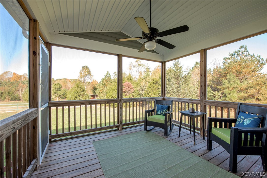 552 Waltons Store Road Louisa, VA 23093 - Photo 47 of 50 a view of a porch with furniture and a yard