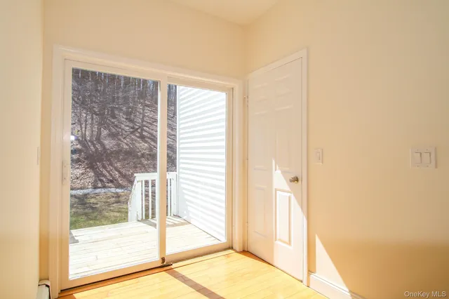 a view of a bathroom with a glass door