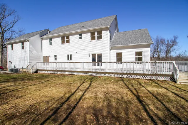 a view of a house with swimming pool