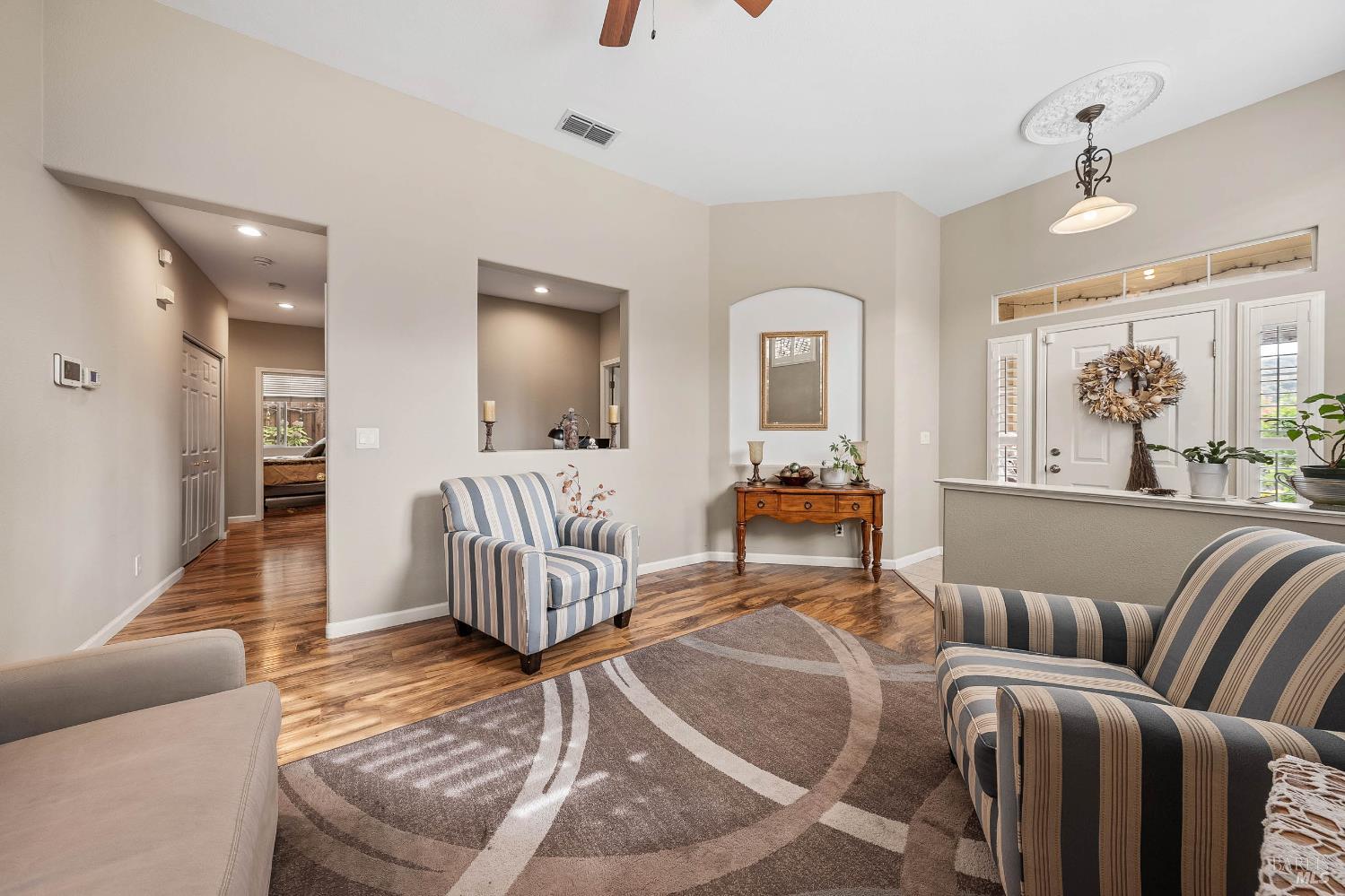 2545 Thistle Creek Street Santa Rosa, CA 95404 - Photo 15 of 59 a living room with furniture and wooden floor