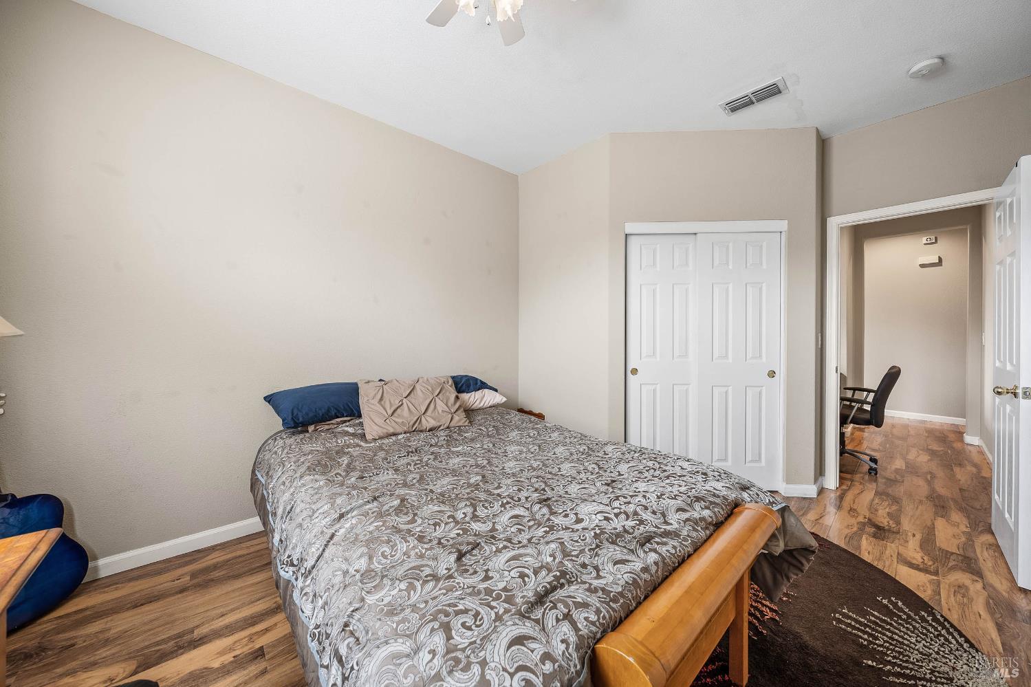 2545 Thistle Creek Street Santa Rosa, CA 95404 - Photo 30 of 59 a bed sitting in a bedroom next to a cabinet