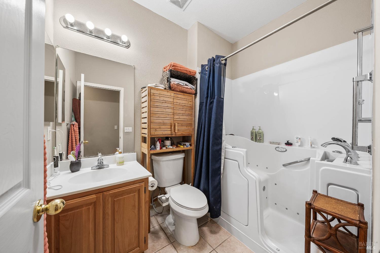 2545 Thistle Creek Street Santa Rosa, CA 95404 - Photo 34 of 59 a bathroom with a sink toilet vanity and shower
