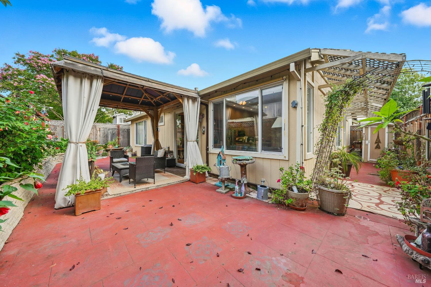 2545 Thistle Creek Street Santa Rosa, CA 95404 - Photo 43 of 59 a view of the chair and tables in the patio