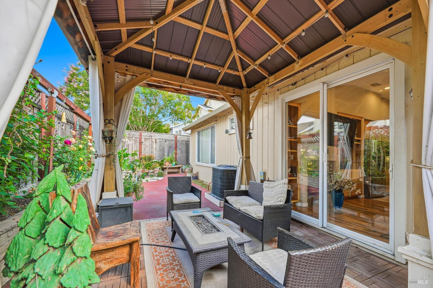 2545 Thistle Creek Street Santa Rosa, CA 95404 - Photo 46 of 59 a patio with yard glass top table and chairs